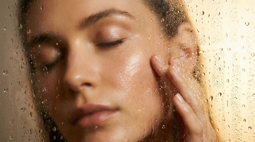 Hydrated face visible through condensation glass showing sealed moisture barrier